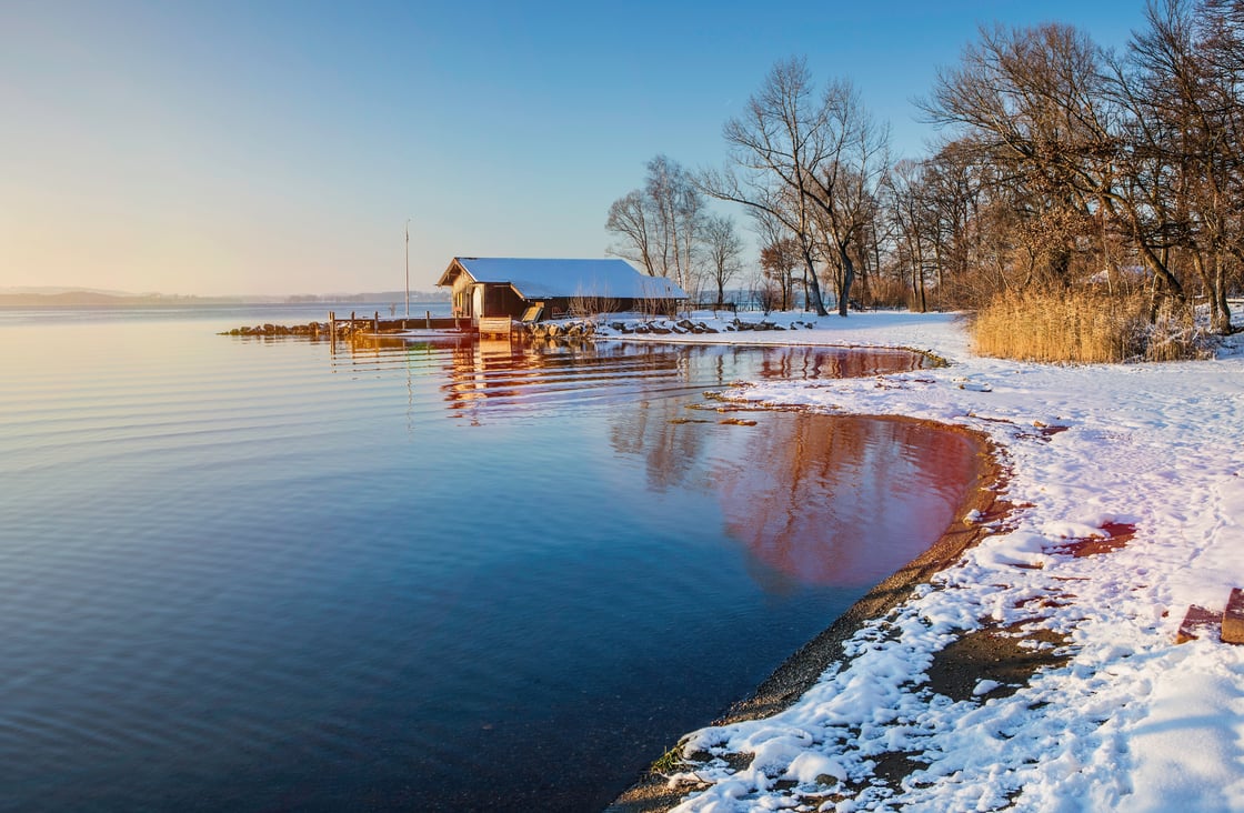 snowy-landscape-and-still-rural-lake-2025-04-04-21-28-04-utc